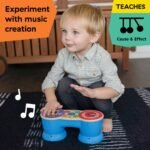 Fëmijë duke përdorur daulle muzikore Magic Touch