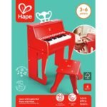 Set piano elektrike prej druri me karrige Hape në paketim